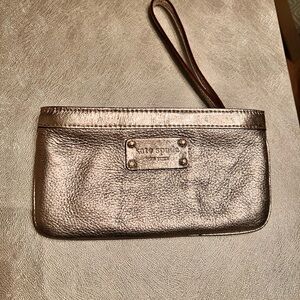 KATE SPADE Gold Metallic Clutch Wristlet 8" x 4". ZIP close. NWOT Pink lining.